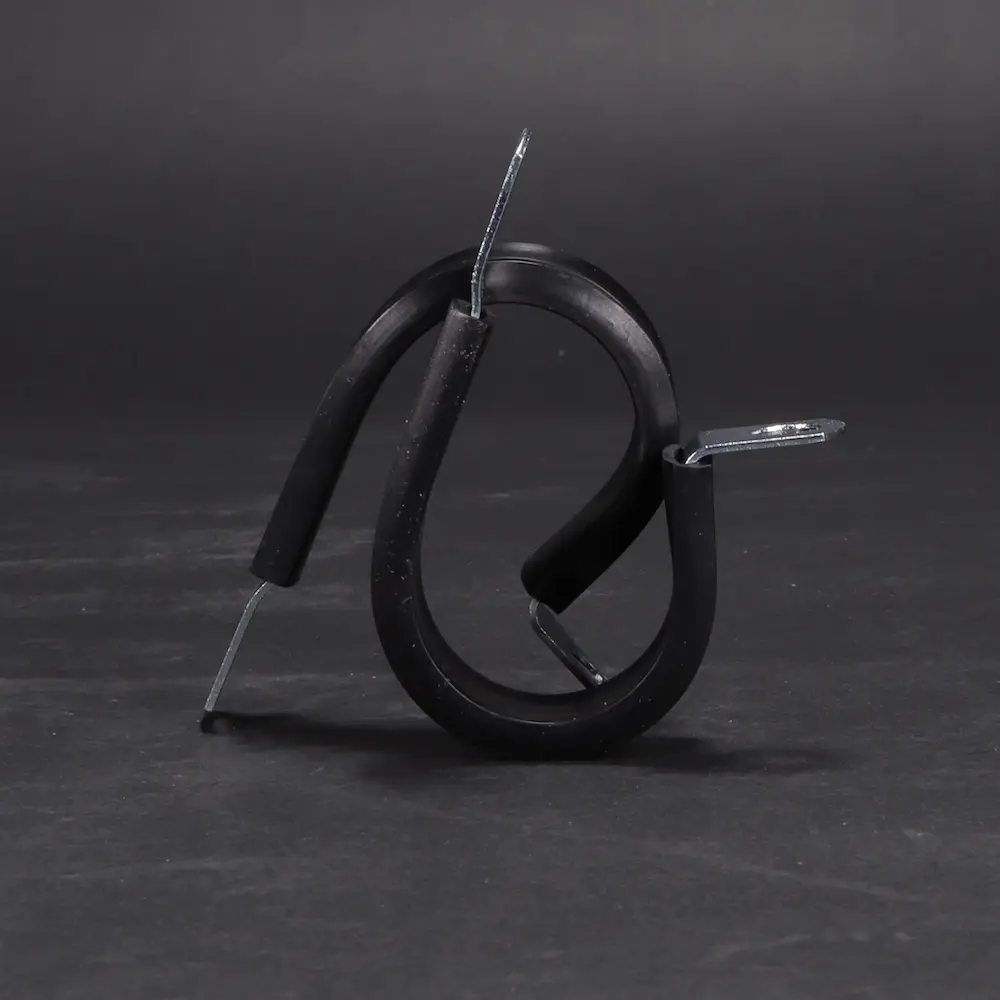 Two cable clamps on a black background; Decorative Image